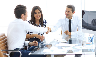 Business people shaking hands, finishing up a meeting