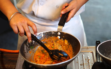 Closeup of making or cooking Indian street food vegetable curry