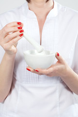 Female pharmacist holding a blank visiting card