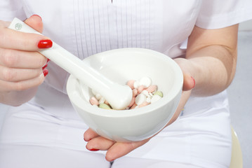 Female pharmacist holding a blank visiting card