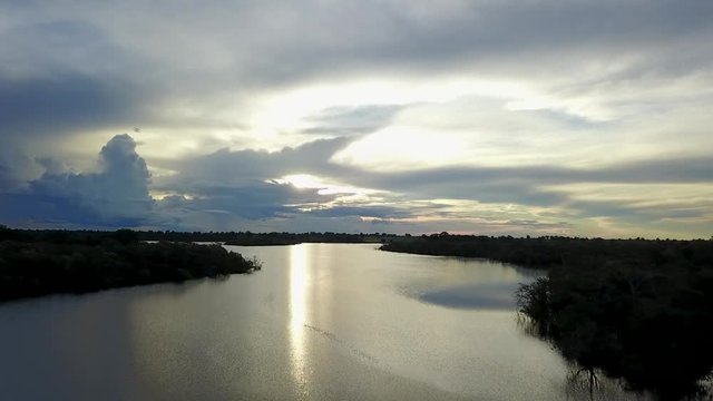 Aerial drone footage of lake during sunset