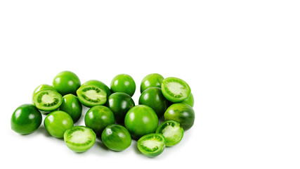 green tomatoes on isolated white background, raw. copy space, template.