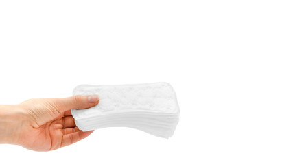 woman hand holding sanitary napkin. Isolated on white background. copy space, template.