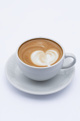 Coffee latte in a white mug on a white background.