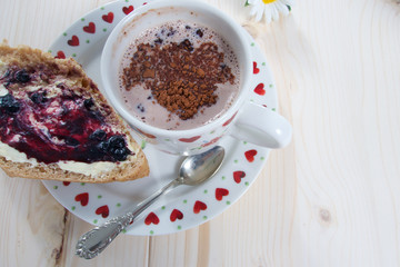 Hot sweet cocoa drink with milk and chocolate