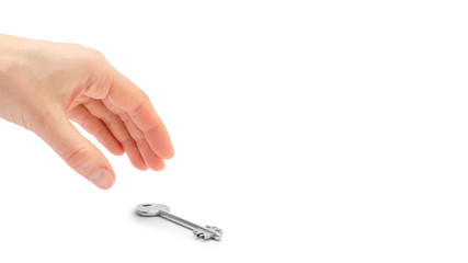 female hand takes or gives key. Isolated on white background. copy space, template.