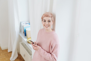 Fototapeta premium Happy relaxed young woman with a lovely smile