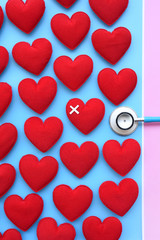 Red heart with stethoscope for background