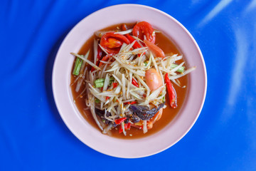 Papaya salad on table,National food of Thailand,Papaya salad and grilled Chicken