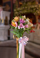 bouquet of flowers in a church. Church decoration for ceremonies.