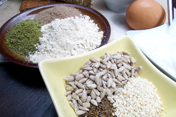 Fresh ingredients for preparation low carb healthy seed bread from pumpkin, flax and sesame flour