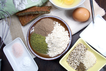 Fresh ingredients for preparation low carb healthy seed bread from pumpkin, flax and sesame flour