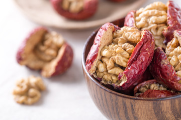 Closeup of red date stuffed with walnut