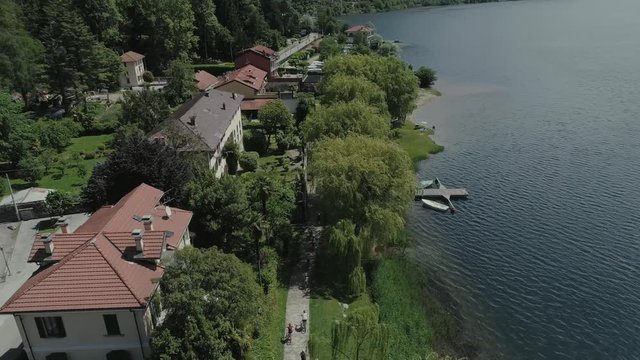 bicycle sumer italy Italian riviera houses drone flight near the mountains, Italy lake, drone 4k nature flight hootel