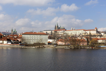 Fototapeta na wymiar Early Spring Prague gothic Castle with the Lesser Town above River Vltava in the sunny Day, Czech Republic