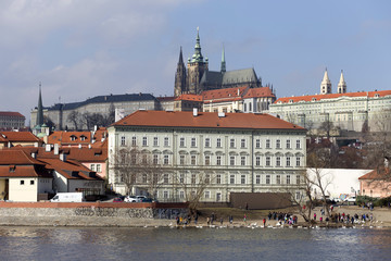 Fototapeta premium Early Spring Prague gothic Castle with the Lesser Town above River Vltava in the sunny Day, Czech Republic