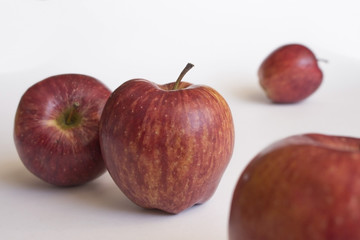 red apples on white background