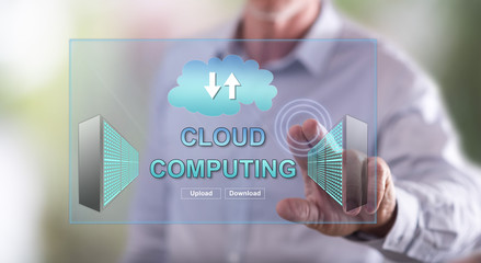 Man touching a cloud computing concept on a touch screen