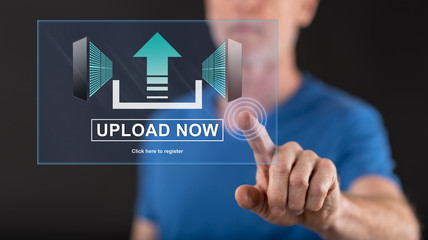Man touching an upload concept on a touch screen