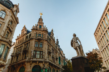 Fototapeta na wymiar low angle view of statue in historical quarter of Antwerp, Belgium