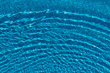 water texture in a pool with waves and reflection