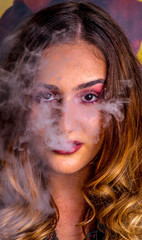 Girl smoking shisha close up