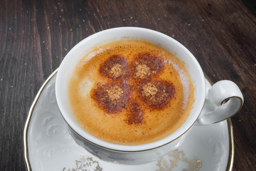 Closeup of cup of coffee with pattern and nice design