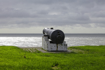 Historic cannon in the sea coast