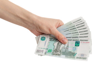Hand with Russian rubles, isolated on white
