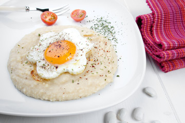 Delicious beef meat with onion, bean side dish and egg