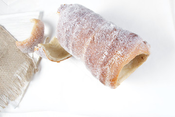 Sweet tasteful traditional slovak and czech roasted delicacy - vanilla trdelnik