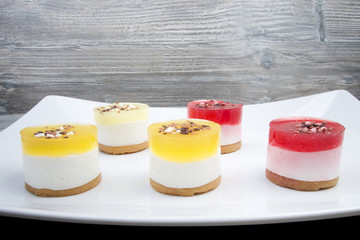 Sweet colourful fruit panna cotta with chocolate decoration