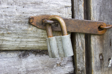 door lock old rusty wooden background