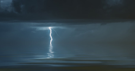 lightning bolts reflection over the sea. taken during a thunderstorm over the ocean with clouds in the background