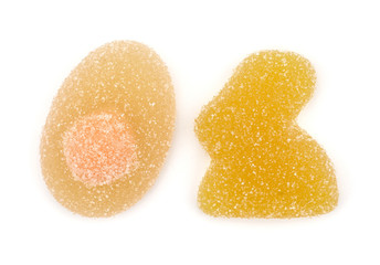 Jelly Easter top view isolated on white background two marmalade sweets yellow bunny and lemon egg shapes.