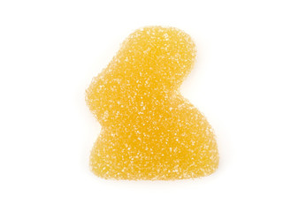 One jelly Easter lemon bunny top view isolated on white background two marmalade sweets.