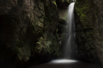 Fototapeta na wymiar Beautiful Waterfall in mounain (Adrspach Rock City) 