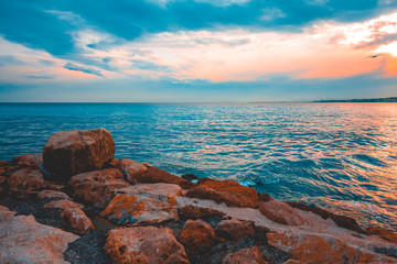 some orange stones at bay in Nice, france