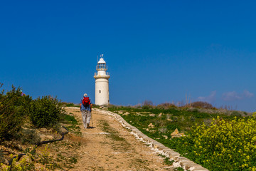 Fototapeta na wymiar Lighthouse near the ancient Odeon Amphitheatre. Paphos, Cyprus