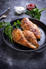 Grilled chicken breast or fillet on iron pan