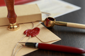 Notary's public pen and stamp on testament and last will.