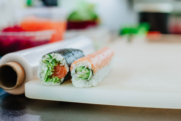 The chef prepares sushi. Preparing of the sushi