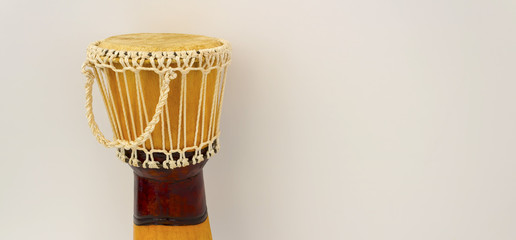 drum in front of white wall