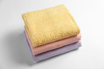 Clean towels on white background