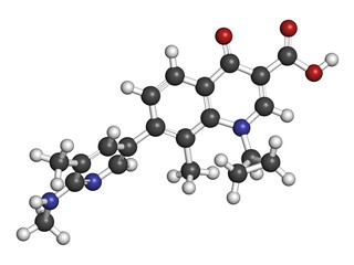 Ozenoxacin antibiotic drug molecule, used in treatment of impetigo. 3D rendering. Atoms are represented as spheres with conventional color coding.