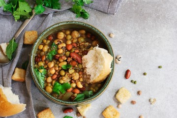 Cooked mixed legumes beans lentils soup / Healthy meal concept