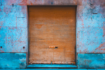 orange garage door on old building