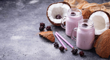 Fototapeta na wymiar Smoothie with blackberries and coconut milk