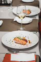 delicious salmon in a restaurant. small portion