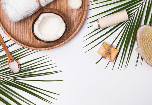 Body care producs, coconut and green leaves